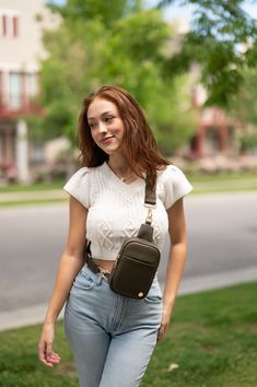 Introducing the Bridget Sling Crossbody—a chic vegan leather bag designed to be the perfect size to carry your daily essentials. Crafted with sleek lines and classic style, it's the ideal accessory for a sophisticated, timeless look. This women's crossbody also features three pockets for effortless organization and an adjustable strap for a customizable fit. Details: 5.5" long x 7.75" height x 2" wide 1 exterior zippered pocket 2 interior slip pockets (fits a phone) Pebbled vegan leather Gold ha Leather Bag Design, Vegan Leather Bag, Convertible Bags, Chic Bags, Fit Details, Daily Essentials, Modern Chic, Signature Collection, Bag Set