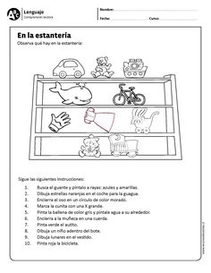 a worksheet with an image of a child's bed and toys in it