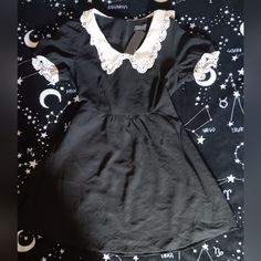 Bought This Dress A While Back. It's Loose On Me Now And Would Like The Money Back And Find Another One In The Correct Size. - Deadstock Item/Size - No Flaws Found - 93% Rayon, 7% Polyester - Machine Wash Cold, Hang Dry Please Refer To Dolls Kill's Size Guide On Their Website: Dollskill.Com/Size-Guide Cute Black Mini Dress With Short Sleeves, Cute Black Dress For Night Out, Fitted Mini Dress With Lace Collar And Short Sleeve, Black Dress With Lace Collar For Night Out, Black Lace Collar Dress For Night Out, Baby Doll Dress Black, Casual Dress With Lace Trim And Doll Collar, Black Summer Dress With Peter Pan Collar, Spring Black Mini Dress With Lace Collar