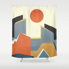 a shower curtain with an abstract design on the front and back side, featuring oranges, blue, yellow, and black shapes