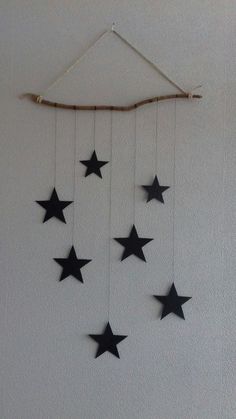 black stars are hanging on the wall