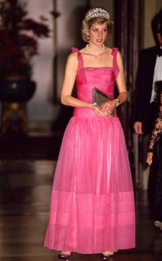 the princess of wales wearing a pink dress and tiara at an event in england