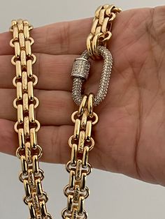 This is a show stopping necklace. Shiny gold, electroplated brass, multilink textured chain with a gorgeous oval pave carabiner with a pave screw lock. Choose 1 of 4 pave carabiners #1 Gold with a gold screw #2 Silver with a silver screw #3 Gold with a silver screw #4 Silver with a gold screw Mixed metal colors and material have become a big fashion statement. The chain is lead safe and nickel free. The chain is 11mm wide , chunky and thick. Great weight and sits beautifully around the neck. The Carabiner Necklace, Brass Texture, Big Fashion, Chunky Necklace, Vintage Jewels, Stunning Necklace, Keep Jewelry, Gold Chain Necklace, Gold Texture