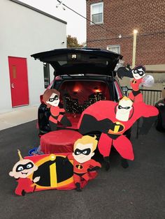 the back of a car decorated with cartoon characters