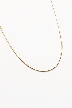 Wolf Circus Sylvie 8 sided snake chain necklace in gold. 18” long in 14k gold vermeil. Links are 1mm in width. WC-N-SYLVIE PIPE AND ROW Minimalist 14k Gold Snake Chain Necklace, Minimalist 14k Gold Snake Chain Jewelry, Classic 14k Gold Snake Chain Necklace, Everyday Snake Shape Box Chain Jewelry, Minimalist 14k Gold Snake Chain Necklace Gift, Minimalist Yellow Gold Snake Chain Necklace As Gift, Minimalist Yellow Gold Snake Chain Jewelry, Tarnish Resistant Yellow Gold Snake Chain Necklace Gift, Minimalist Gold Plated Snake Chain Necklace As A Gift