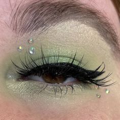 Green Eyeshadow Looks With Rhinestones, Green Eye Makeup With Rhinestones, Green Makeup With Gems, Eye Makeup Stones, Green Makeup Looks With Gems, Jeweled Eye Makeup, Sage Green Prom Makeup, Light Green Eyeshadow Looks, St Patrick Makeup