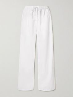 Even The Row's more relaxed designs maintain an air of elegance. Tailored from cotton-poplin, these 'Hubert' pants have adjustable drawstrings and fall to roomy wide legs. Style them with a simple T-shirt and slides. White Poplin Shirt, Poplin Pants, Japanese White, White Wide Leg Pants, Simple T Shirt, Simple Tshirt, Wide Legs, Denim Jumpsuit, Poplin Shirt