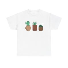 A cactus and succulent themed T-Shirt perfect for plant lovers and nature enthusiasts. This classic fit tee is made from sustainable and durable cotton, ensuring year-round comfort. The crew neckline adds a neat, timeless look that can suit any occasion, casual or semi-formal. Ideal for those who appreciate the beauty of nature and want a comfy, relaxed wear. Product features - Made from strong and smooth fabric perfect for printing - Elastic ribbed knit collar without seam - Shoulder tape stabilizes back of garment - Ethically grown and harvested 100% US cotton - Certified by Oeko-Tex for safety and quality assurance Care instructions - Machine wash: warm (max 40C or 105F) - Non-chlorine: bleach as needed - Tumble dry: medium - Do not iron - Do not dryclean Gardening Apparel, Southwest Desert, Gardening Outfit, Desert Plants, Gifts For Nature Lovers, Cacti And Succulents, Green Thumb, Workout Tee, Nature Lover