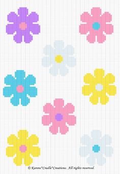 a cross stitch pattern with flowers in different colors and sizes on the side of it