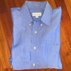 Tommy Bahama Blue Men’s Dress Button Down Shirt Size 16 1/2 - 34-35 One Front Open Pocket Solid Blue Like Brand New! Excellent Condition! Includes One Extra Button One Fell Off Ready To Ship To You Today A5 Summer Light Blue Dress Shirt With Button Closure, Summer Blue Dress Shirt With Buttons, Blue Business Shirt With Pockets, Business Blue Shirt With Pockets, Blue Cotton Short Sleeve Dress Shirt, Blue Cotton Dress Shirt With Pockets, Blue Relaxed Fit Button-up Dress Shirt, Blue Short Sleeve Dress Shirt For Summer, Casual Light Blue Short Sleeve Dress Shirt