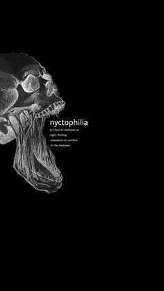 a black and white photo of an animal's head with the words nyctophilia on it