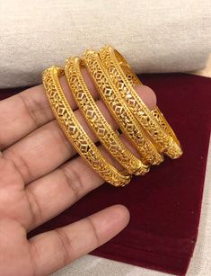 Christmas Gift, Holiday Gift,  24k gold plated Bangles, Indian Bridal Bangles, Handmade Bracelet for Women Gold Bangles for Women - Indian Bridal Bangles - Handmade Bracelet These stylish bangles feature a classic bangle design and are available in gold color. ▶ BEAUTIFUL HINGED GOLD BRACELET ▶ HIGED TO OPEN WIDE----- STAYS SECURELY SHUT ----- LIFT TAB SIDE TO OPEN Material: High quality 24k gold plated bangles ( Not solid gold) Diameter: 2.36 inches Can open Lead & Nickel free Tarnish resistant Gold Meenakari Bracelets For Puja, Gold Meenakari Bracelets, Yellow Bracelets With Intricate Design For Festivals, Gold Bollywood Jewelry With Openable Detail, Gold Meenakari Bangle For Puja, Gold Meenakari Bracelet For Diwali, Gold Bracelets For Diwali, Gold Plated Bollywood Bracelet With Intricate Design, Gold Bangle With Intricate Design For Puja