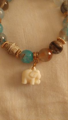 Handmade Agate Gemstone Carved Bone Elephant  Dangle Tassel Stretch Bracelet Handmade Bohemian Jade Stretch Bracelet, Beads Craft, Carved Bone, Bone Carving, Agate Gemstone, Miami Beach, Bead Crafts, Stretch Bracelet, Stretch Bracelets