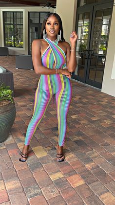 Elevate your summer wardrobe with our Summer Pinstripe Jumpsuit. Made in a stretchy colorful striped print, featuring a versatile wrap top Constructed with a stretchy and stylish striped print, this jumpsuit is the perfect addition to your summer wardrobe. The wrap top provides versatility and comfort, making it a must-have for any fashion-forward individual. Model Measurements: 32bust-24Waist-34Hips (Small) Processing Time: 7-12 business days prior to shipping. PLEASE NOTE: All items are made t Striped Stretch Jumpsuits And Rompers For Spring, Trendy Striped Jumpsuits And Rompers For Summer, Trendy Striped Jumpsuits And Rompers For Vacation, Trendy Striped Fitted Jumpsuits And Rompers, Trendy Fitted Striped Jumpsuits And Rompers, Trendy Striped Jumpsuits And Rompers For Beach, Pinstripe Jumpsuit, Wrap Jumpsuit, 10 Year Anniversary