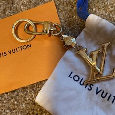 Great Charm/Key Chain. Nwt, Box And Dust Cover. Never Used. Looks Amazing On Purses Or Used As A Key Chain, Love U Can Change To Most Lv Purses. Hate To Let Go, But Should Be Used Instead Of Sitting In A Drawer. I Am Sorry But I Can Negotiate Price But Not Much Lower Than What Is Listed, Paid A Lot More Than That And Would Loose Too Much Money. Luxury Jewelry Gift With Metal Logo, Luxury Jewelry With Metal Logo For Gift, Louis Vuitton Keyring, Louis Vuitton Keychain Wallet, Louis Vuitton Key Holder With Keys, Louis Vuitton Coin Purse Keychain, Louis Vuitton Luggage Tag, Louis Vuitton Accessories Key Chains, Louis Vuitton Keychain