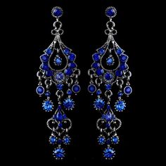 Blue Crystal Chandelier Formal and Wedding Earrings Add a pop of color to your attire with these stunning chandelier earrings. These dramatic earrings feature sparkling royal blue crystals in a beautiful antique silver plated chandelier design. Perfect for your wedding day, prom, quinceanera or pageant! Size: These glistening earrings are about 3 1/4" long. Color: Silver /Royal Blue. Style: e1028rbl. Need several pair of earrings for your bridal party or damas? You can buy in bulk and save! Plea Green Statement Earrings, Earrings For Wedding, Blue Chandelier, Dramatic Earrings, Formal Earrings, Blue Crystal Earrings, Crystal Chandelier Earrings, Wedding Earrings Drop, Prom Earrings