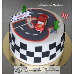 a birthday cake with a race car on it