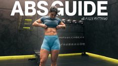 a woman standing in front of a gym machine with the words abs guide above her