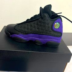 Air Jordan 13 Retro Gs Black/Purple Sporty Purple High-top Basketball Shoes, Sporty Purple Jordan Shoes For Streetwear, Purple Sporty Jordan Shoes For Streetwear, Purple Lace-up Jordan Shoes For Streetwear, Purple High-top Jordan Shoes, Purple Basketball Shoes With Air Max Cushioning, Purple Jordan Shoes For Sports, Purple High-top Jordan Shoes For Streetwear, Purple Air Cushioned Basketball Shoes