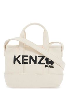 Hey there. If you're looking for a trusty companion to carry your daily essentials, this Kenzo tote bag might just be your new best friend. It's practical, stylish, and all about making your life easier, whether you're heading to work or out for a casual weekend stroll. Crafted from pure cotton denim. Features a contrasting logo print and snap closure. Includes a fabric interior with a credit card slot. Offers versatile carrying options with double handles and a shoulder strap. | Kenzo Women's S Utility Tote Bag, Utility Tote, Denim Tote Bags, Denim Tote, Travel Case, Womens Tote, White Bag, Small Bag, Womens Tote Bags