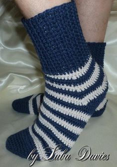 a person wearing blue and white striped socks