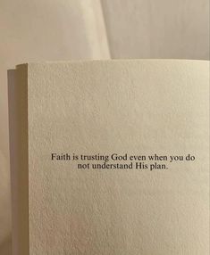 an open book with the words faith is trusting god even when you do not understand his plan