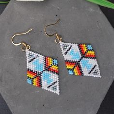 Handmade Southwestern Beaded Earrings For Gifts, Southwestern Style Earrings With Tiny Beads For Gift, Southwestern Handwoven Beaded Earrings For Gift, Handmade Geometric Earrings For Gift, Southwestern Style Beaded Earrings With Ear Wire As Gift, Southwestern Dangle Beaded Earrings As Gift, Southwestern Dangle Beaded Earrings For Gifts, Southwestern Style Small Beaded Earrings For Gift, Handmade Geometric Multicolor Jewelry