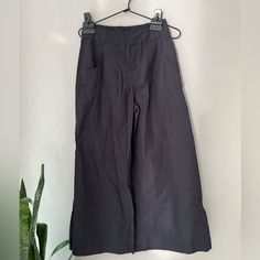 This Is New With The Sample Tag Still Attached. Color: Washed Black Wide Leg Ankle Pants In Lightweight Cotton. Has Front Pockets. Size 2 26” Inseam 11” Rise 15” Leg Opening 12 1/2” Across The Waistband Casual Black Cotton Culottes, Black Cotton Casual Culottes, Black Relaxed Fit Cropped Leg Capris, Black Cropped Leg Bottoms With Pockets, Black Wide Leg Cotton Culottes, Black Relaxed Fit Wide Leg Capris, Black Cotton Wide Leg Culottes, Black Wide Leg Relaxed Fit Capris, Black Capris With Pockets For Spring