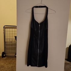 Black Leather Down The Middle Of The Dress And Spandex On The Sides. Zipper Down The Back And Snap Around The Neck. Size L. No Refunds. Black Stretch Bodycon Dress With Side Zipper, Fitted Black Bodycon Dress With Zipper Closure, Black Knee-length Bodycon Dress With Side Zipper, Black Stretch Mini Dress With Side Zipper, Black Bodycon Dress With Side Zipper For Night Out, Black Evening Dress With Zipper Closure, Black Zipper Closure Club Dress, Black Sleeveless Dress With Zipper Closure, Black Edgy Mini Dress With Back Zipper