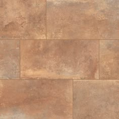 an image of a tile floor that looks like it is made out of brown stone