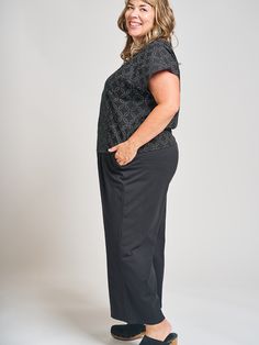 These elastic waist black pants combine comfort and fashion with an on trend wide leg silhouette. They maximize on comfort and fit, making the perfect WFH pant (though they hold their own in a real office, too!). 95% Organic Cotton 5% Spandex Pockets Elastic waist Made fair trade in India by one of our longstanding production partners Wide Leg Plus Size, Loose Tunic, Fair Trade Clothing, Black Jersey, Plus Size Pants, Plus Size Top, Black Wrap Dress, Black And White Colour, Diamond Design