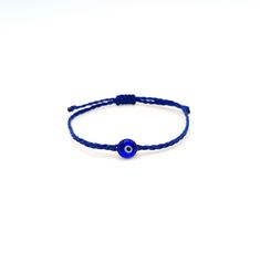 Blue evil eye Braided bracelet, Glass coin bead, Unisex, Adjustable, Good luck, All seeing, Devil eye, Protection amulet, Spiritual jewelry This simple yet beautifull bracelet is made using durable waxed string and has a glass bead evil eye in the middle. It is adjustable with a sliding knot closure. Other evil eye bracelets from my shop: https://www.etsy.com/shop/LuckyRatJewellery?section_id=14785936&ref=shopsection_leftnav_5 Other charm bracelets in my shop: https://www.etsy.com/shop/LuckyRatJ Rat Jewellery, Sliding Knot Closure, Eye Bracelets, Devil Eye, Protection Amulet, All Seeing, Minimalist Gifts, Braided Bracelet, Blue Evil Eye