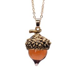 Product Description Seasons change, but the beautiful acorn is appreciated throughout the whole year! This autumn-inspired charm features an amber-colored quartz cabochon on the bottom of an antique finish silver top, giving this pretty acorn a rustic, wintry vibe. Refresh your jewelry collection with this colorful acorn charm necklace that makes a fabulous gift. The ring link bail on top of the acorn makes it easy to set on any link chain. Features: Compatible with All Major Brand Charm Bracele Rich Jewelry, Acorn Jewelry, قلادات متدلية, Pinecone Necklace, Pinecone Pendant, Acorn Pendant, Women Choker Necklace, Acorn Necklace, Womens Chokers