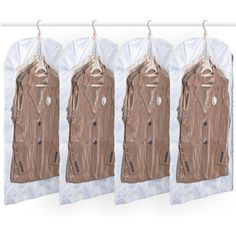 three coats hanging on a clothes line in front of a white background