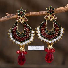 Red Jewelry With Latkans For Festivals, Red Jewelry With Latkans For Celebration, Red Dangle Jewelry With Latkans, Red Dangle Latkans Jewelry, Elegant Red Jewelry With Latkans, Festive Red Drop Earrings, Red Chandbali Jewelry With Latkans, Red Jewelry For Christmas Celebration, Red Party Jewelry For Festive Season