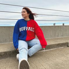 "Stay cozy and stylish with our Split Buffalo Crew! This two-toned color block crewneck features a bold red and royal blue design with an embroidered appliqué \"Buffalo\" on the front. Made with high-quality French Terry material, this sweatshirt is built to last and keep you comfortable for years to come. Product Description: -Two-toned color block design in red and royal blue -Embroidered appliqué \"Buffalo\" on the front -Soft and comfortable French Terry fabric -Size-inclusive, available in a S-4X Care: Machine wash gentle cold inside out with like colors. Hang Dry The Split Buffalo Crew is the perfect addition to any wardrobe, whether you're a Buffalo native or just love the bold, eye-catching design. Made with soft and comfortable French Terry material, this sweatshirt is perfect for Bills Sweatshirt, Royal Blue Design, Buffalo Bills Sweatshirt, Buffalo Bills Football, Bills Football, Color Block Design, Terry Fabric, French Terry Fabric, Buffalo Bills