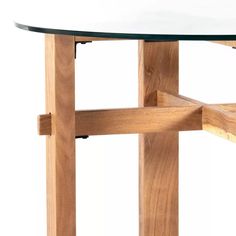 a wooden table with glass top on white background