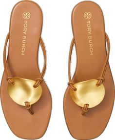 Gold Leather Almond Toe Sandals, Luxury Leather Flip Flops With Single Toe Strap, Classic Gold Sandals With Single Toe Strap, Chic Toe Post Flip Flops With Cushioned Footbed, Elegant Leather Flip Flops With Branded Insole, Chic Flip Flops With Cushioned Footbed And Toe Post, Brown Almond Toe Sandals With Textured Sole, Classic Sandals With Textured Sole, Elegant Toe Post Sandals With Cushioned Footbed