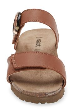 A rounded buckle stands out at the strap of a summery sandal set on a walkable wedge for everyday comfort and style. 1 1/4" heel (size 39) Adjustable hook-and-loop straps Cushioned footbed with arch support Leather upper and lining/synthetic sole Imported Brown Slingback Sandals With Buckle Closure, Brown Slingback Sandals With Buckle And Round Toe, Brown Sandals For Everyday Spring Use, Brown Everyday Footbed Sandals For Spring, Brown Slingback Footbed Sandals With Leather Footbed, Brown Leather Footbed Slingback Sandals, Brown Leather Footbed Sandals For Everyday, Everyday Brown Leather Footbed Sandals, Brown Sandals With Leather Footbed For Everyday