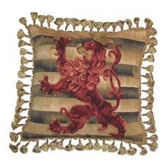 a decorative pillow with a lion on it