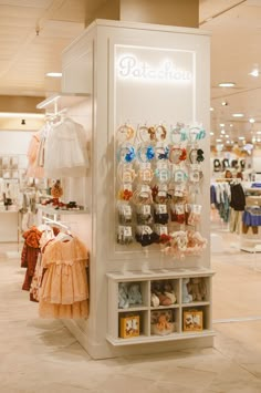 a display case in a store filled with baby items