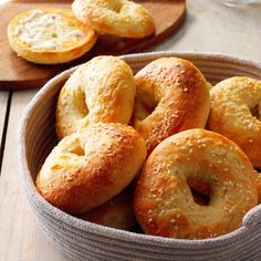 bagels in a bowl on a wooden table