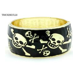 Black Enamel Gold Tone Punk Goth Biker Hinged Cuff Bangle Bracelet New! This Black Enamel Skulls Cuff Bracelet Is A Popular Modern Style Similar To Current Alexander Mcqueen Designs. It Has A Width Of 1 1/4” Inches, A Diameter Of 2 1/4” Inches And A Circumference Of 7 1/2 “ Inches. The Hinge Closure Allows For Some Adjustability And The Color Combo Makes It A Versatile Piece. See Our Other Listings For The White Version Of This Item. Ships Free New And Sealed! See Our Other Listings For Skulleri Black Punk Bangle Bracelets, Punk Black Bangle Bracelets, Edgy Black Cuff Bracelet For Festival, Black Metal Emo Bracelets, Black Metal Emo Bracelet, Black Punk Cuff Bracelet For Festival, Alexander Mcqueen Designs, Goth Biker, Daisy Bracelet