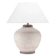 a lamp with a white shade on it