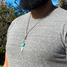 The silver feather necklace is a stunning piece of boho style jewelry, featuring an authentic Native American design with a turquoise Howlite stone and your choice of silver-plated feather. This optional, custom engraved charm pendant makes a meaningful gift, blending cultural heritage with personalized elegance. 🪶 𝗠𝗔𝗧𝗘𝗥𝗜𝗔𝗟𝗦 + 𝗗𝗜𝗠𝗘𝗡𝗦𝗜𝗢𝗡𝗦 ❯  Blue Howlite, Silver-plated Feather, Wood Bead, Leather Cording (tie closure allows up to 30 inches) ❯  15mm Engraved Stainless Steel Charm (optional) 🪶 𝗡𝗘𝗖𝗞𝗟𝗔𝗖𝗘 𝗦𝗧𝗬𝗟𝗘-- select from the following styles (see photo 5 for all) ❯  A (no feather) ❯  B (photo 6) ❯  C (photo 5) ❯  D (photo 8) 🪶 𝗦𝗧𝗢𝗡𝗘 + 𝗘𝗟𝗘𝗠𝗘𝗡𝗧 𝗘𝗡𝗘𝗥𝗚𝗬 ❯  TURQUOISE (color) is known to align the chakras and provides inner peace ❯  WOOD symboli Adjustable Feather Necklace As Gift, Adjustable Bohemian Necklaces With Feathers, Bohemian Feather Jewelry Gift, Bohemian Silver Necklace With Feathers, Bohemian Turquoise Jewelry With Feathers, Turquoise Feather Jewelry As Gift, Turquoise Feather Jewelry As A Gift, Turquoise Bohemian Jewelry With Feathers, Adjustable Turquoise Jewelry With Feathers