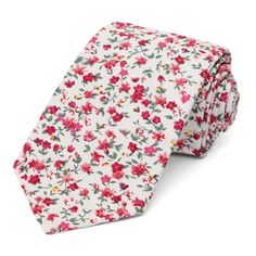 Try out the floral tie trend everyone is wearing. This pink and white floral design is small and unobtrusive, so it's perfect for trying something new. As for the tie itself, it's made from 100% cotton and cut in a narrow and modern 3-inch width. Matching pocket squares are available for purchase, too. Product Features • Narrow 3" width, at the widest point• 57" length, tip to tip• Made from 100% Cotton• Imported Classic White Ties For Spring, White Formal Ties For Summer, White Summer Ties For Formal Occasions, Summer Formal Ties With Floral Print, White Adjustable Standard Tie, Classic White Spring Ties, White Summer Tie, Elegant White Ties For Spring, White Suit And Tie Accessories For Summer