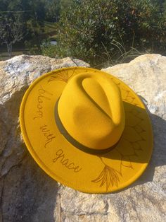 Beautiful yellow burnt felt hat.  Perfect accessory for fall Yellow Fedora Hat For Fall, Adjustable Yellow Wide Brim Felt Hat, Yellow Brimmed Hat For Fall, Yellow Curved Brim Hat For Festival, Yellow Curved Brim Festival Hat, Yellow Festival Hat With Curved Brim, Adjustable Brimmed Yellow Fedora, Adjustable Brimmed Yellow Felt Hat, Yellow Adjustable Fedora With Short Brim