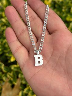 Our 925 Sterling Silver Curb Chain Initial Pendant Necklace will up your look. This individualized item is painstakingly made and has a special and significant appearance. It enhances your outfit with a touch of unique charm and is ideal for any occasion. Discover the beauty of sterling silver right now! ️ Visit my shop for more products https://silvergoldchain.etsy.com Welcome to our collection featuring the 925 Sterling Silver Curb Chain Initial Pendant Necklace. This personalized necklace is Cheap Pendant Necklace With Curb Chain, Cheap Sterling Silver Curb Chain Necklace, Sterling Silver White Curb Chain Necklace, White Sterling Silver Chain Necklace, White Sterling Silver Cuban Link Jewelry, Gift Cuban Link Sterling Silver Necklace, Silver Sterling Silver Necklace With Curb Chain, Silver Initial Pendant Chain Jewelry, Silver Initial Pendant Necklace With Curb Chain