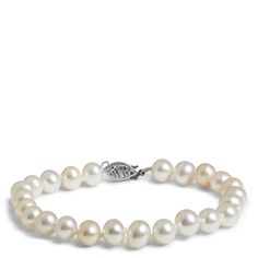 This traditionally-styled and elegant bracelet shows that pearls are for everyone. Made with cultured freshwater pearls with a 14k white gold filigree style clasp, this classic bracelet is perfect for the bride on her special day or any other celebration. Due to the unique nature of pearls, the shade, color shape or texture may vary slightly. Cultured Pearl Bracelet, Classic Bracelets, Freshwater Pearl Bracelet, Unique Nature, Elegant Bracelet, Gold Filigree, Freshwater Cultured Pearls, Curated Gifts, Color Shapes