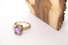 14K Gold ring delicate detailed antique vintage style design, with rectangle Amethyst gemstone. 14K Gold. Antique vintage flowers ornaments and engraving. ring size is size 7-USA , and we sizing it by demand. I make it any size you want. weight : 4.6 gram top width : 1 cm gemstone size : 7*8.8 mm Free worldwide shipping. Heirloom Amethyst Ring With Accent Stones, Heirloom Style Emerald Cut Amethyst Ring As Gift, Heirloom Style Amethyst Ring With Emerald Cut Gift, Heirloom Amethyst Ring With Emerald Cut As Gift, Heirloom Amethyst Ring With Emerald Cut Perfect Gift, Vintage Amethyst Ring With Accent Stones For Wedding, Rectangular Amethyst Ring For Wedding, Vintage Rectangular Stone Wedding Rings, Elegant Rectangular Amethyst Ring In Yellow Gold